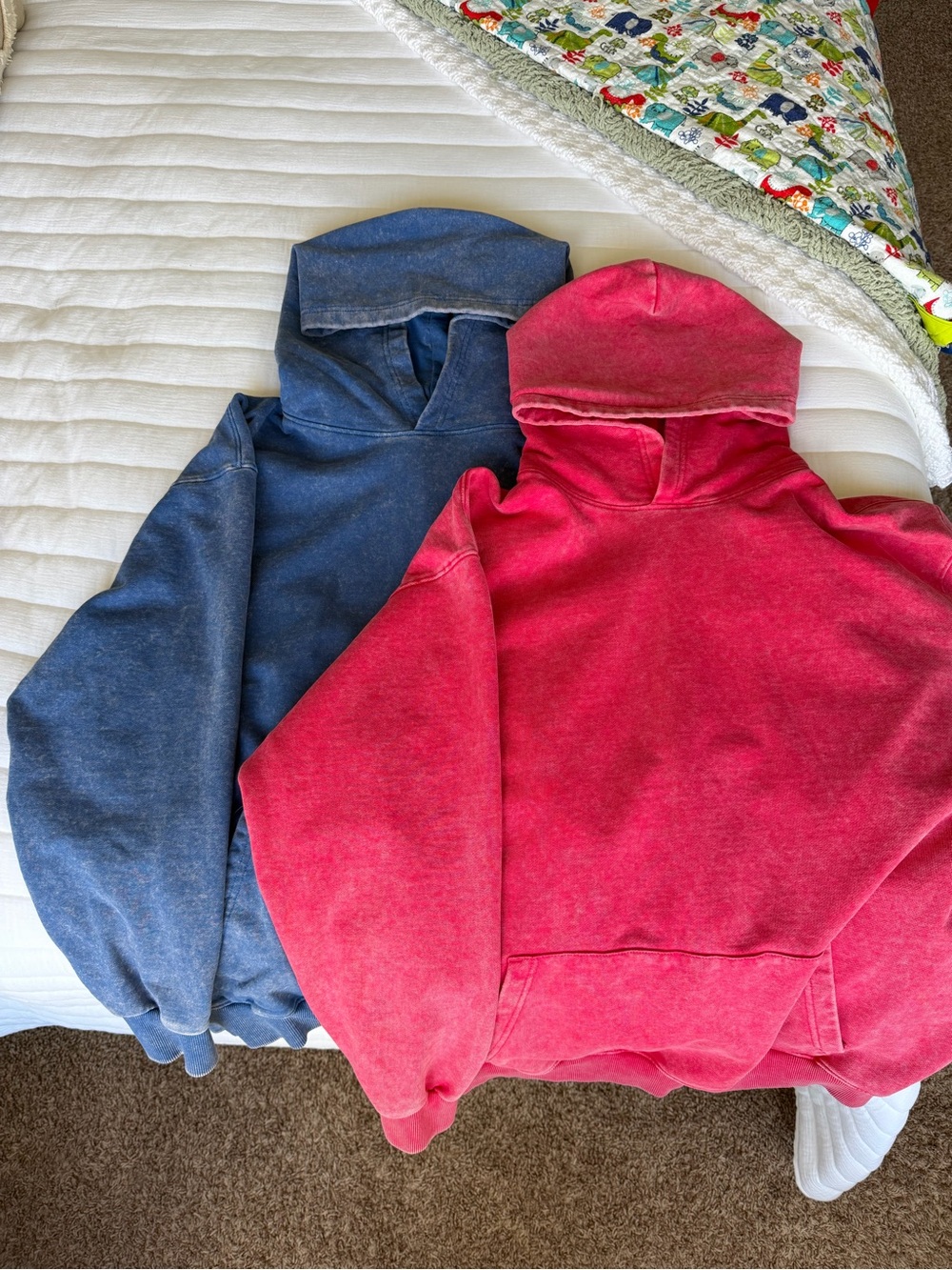 washed blue and red/pinkish hoodies